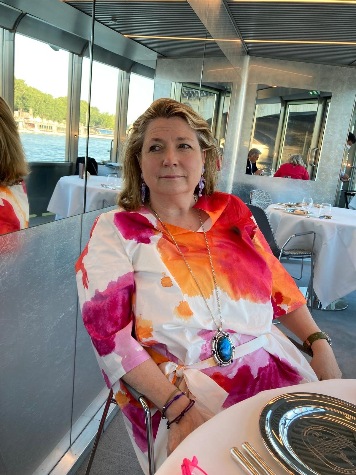 At the table on board Ducasse sur Seine with a view of the Seine