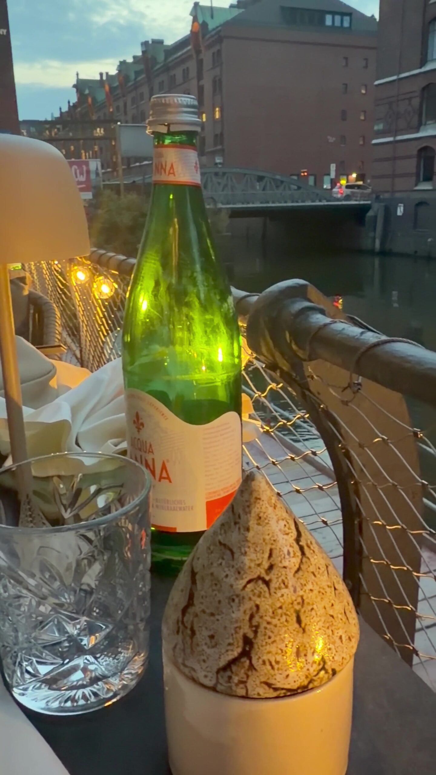 View from Chefs Warehouse terrace across the fleet in Hamburg Speicherstadt at blue hour