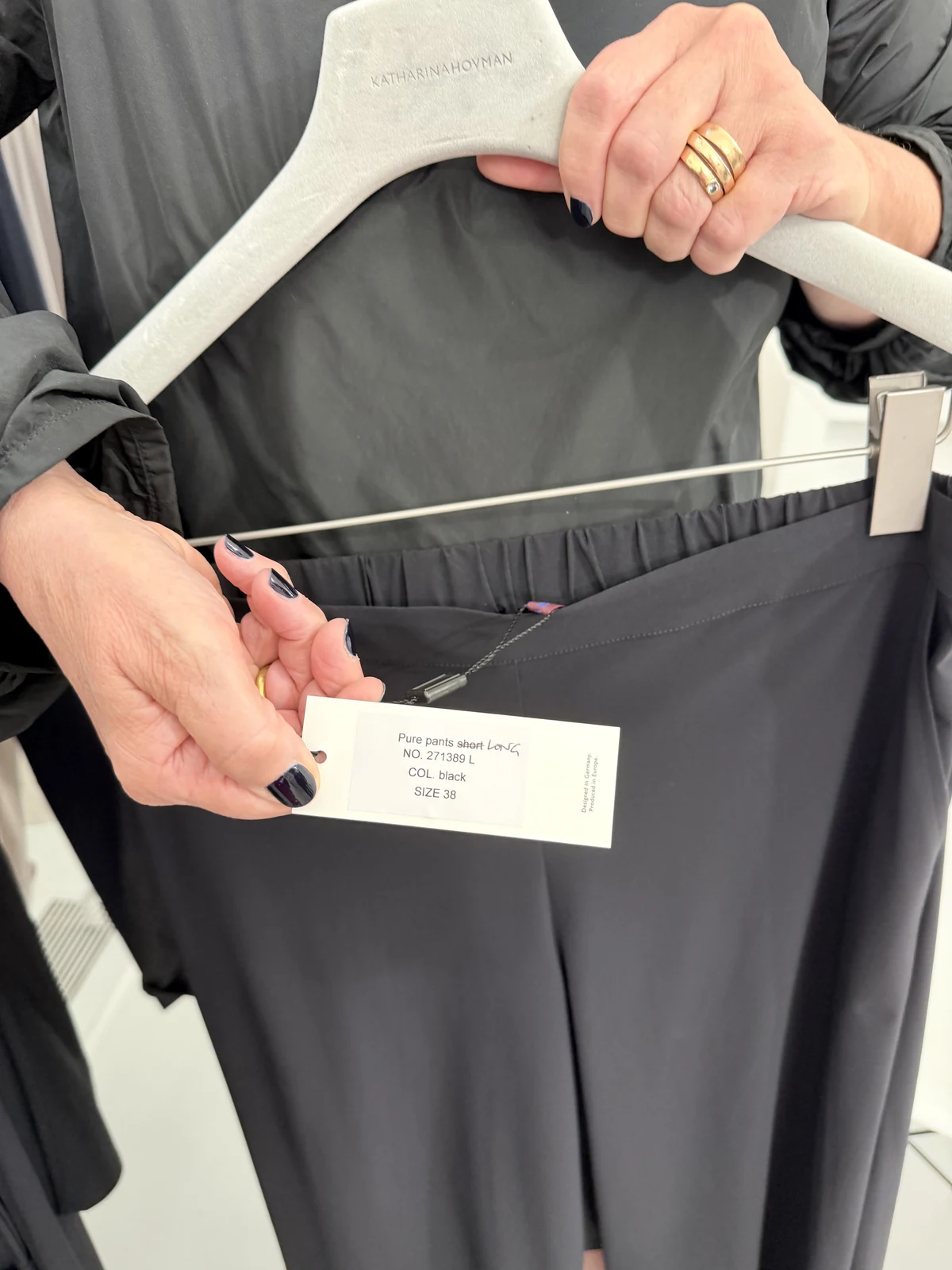 Tag on a pair of Katharina Hovman Pure Pants reading Designed in Germany, Produced in Europe