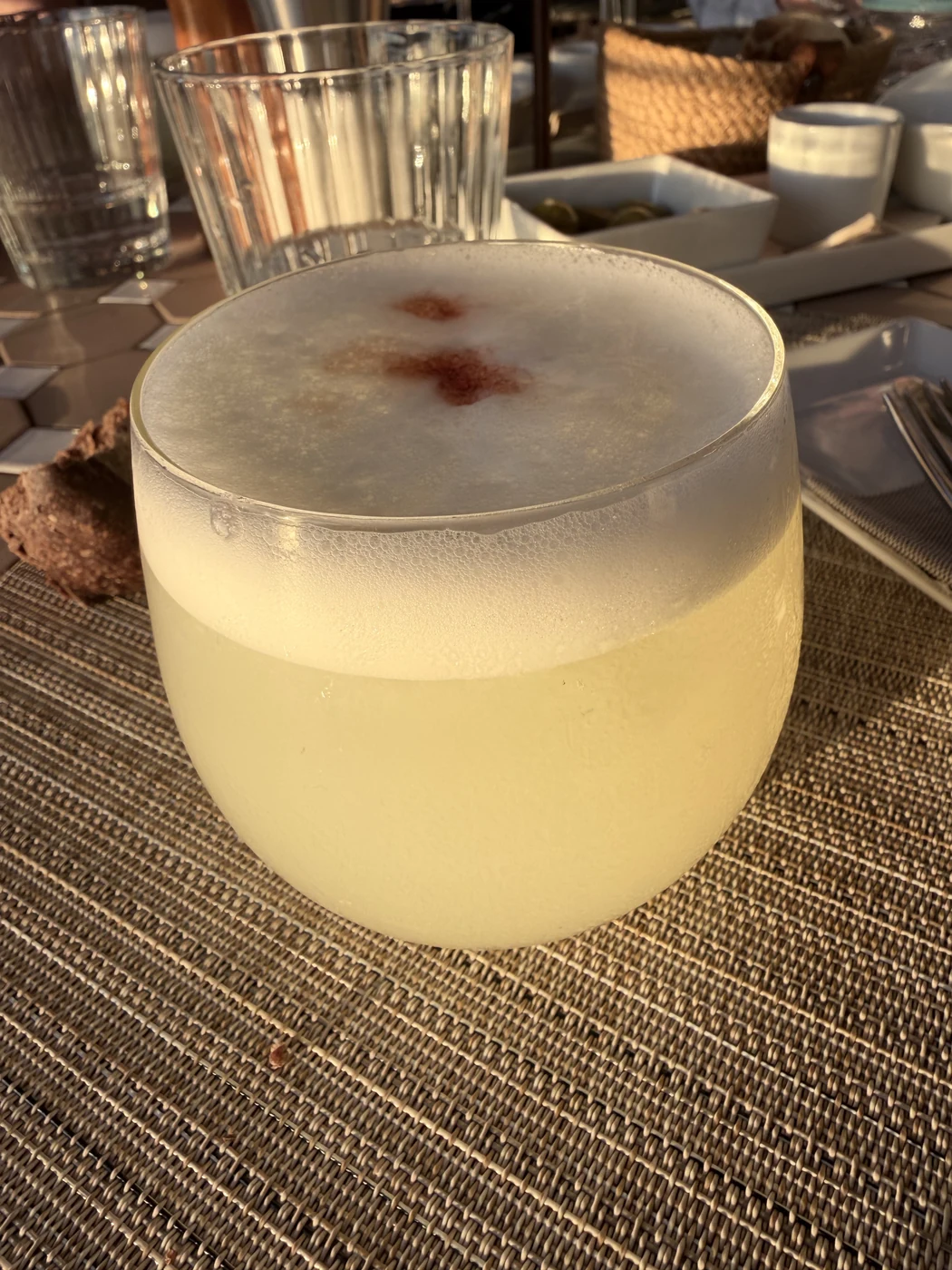 Pisco sour on the table at the Nautilus restaurant in Port de Sóller.