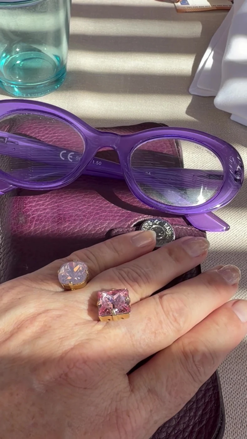 Violet Doubleice reading glasses and the Princess Dream ring by Ekaterini on the table at Portixol.